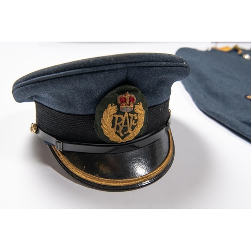 196 - A Post 1953 RAF bandsman's dress tunic and peaked cap, also braid trimmed waistbelt. GC  £30-40