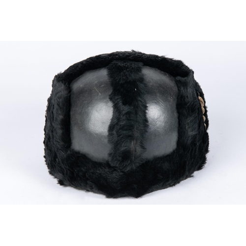 198 - A pre WWII RAF full dress parade helmet, leather covered with fur trim, silk lining, and patent leat... 