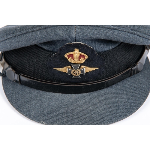 200 - A pre 1953 RAF Chaplain's peaked cap, metal badge with gilt crown, with maker's stamp of Bates, St J... 