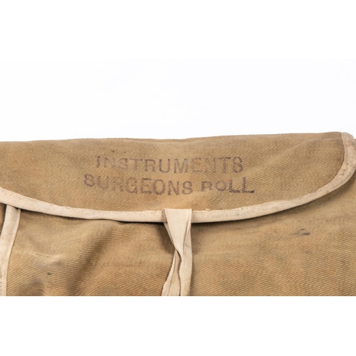 201 - A WWII RAF Medical officers field instrument kit, comprising a khaki linen container marked 