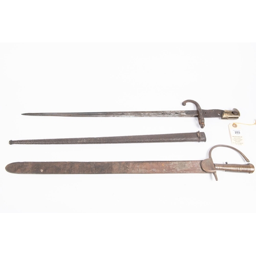 253 - A relic Baker rifle type of sword bayonet, also a Gras bayonet in similar condition. £20-30