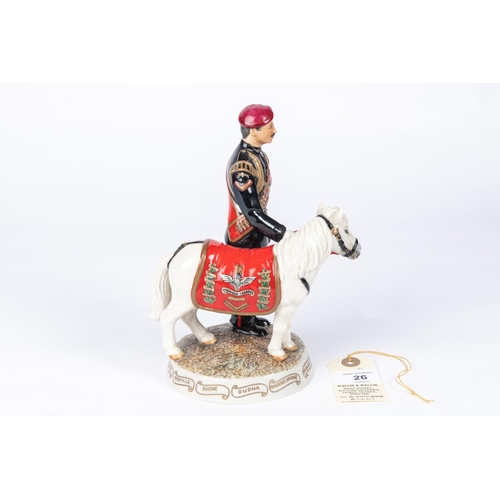 26 - A china figure of a Parachute Regiment Corporal with a pony mascot, 7¾