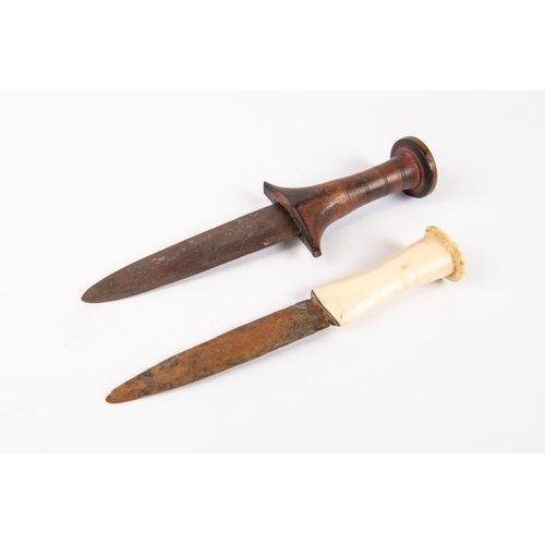 272 - A Sudanese arm dagger, plain flat blade 5¼