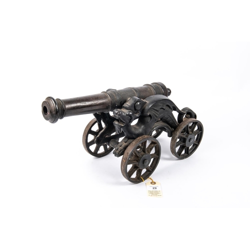 29 - A decorative iron cannon, barrel 15