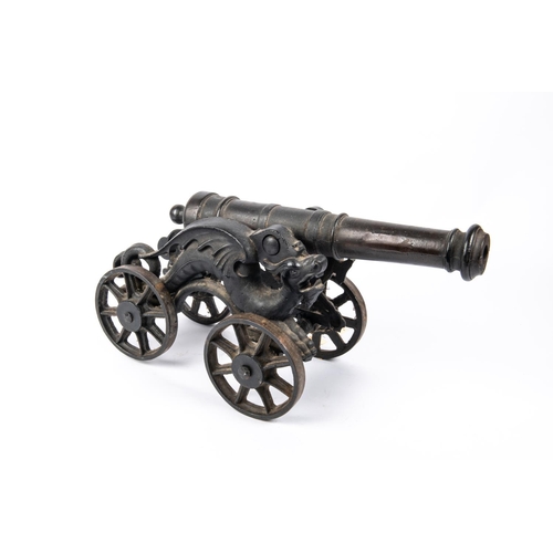 29 - A decorative iron cannon, barrel 15