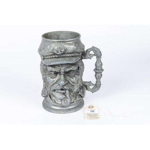 56 - A heavy Third Reich pewter beer stein, cast with grotesque face and engraved 