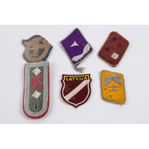 73 - A Third Reich Gross Deutschland Regiment epaulettes; a cloth Fallschirmjager badge; also 8 other ite... 