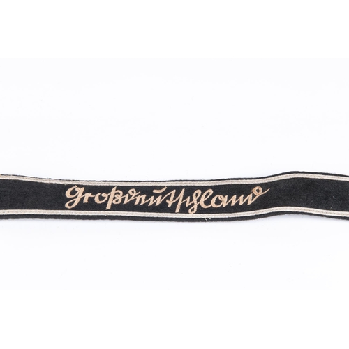 77 - A Third Reich wool embroidered SS cuff title, 