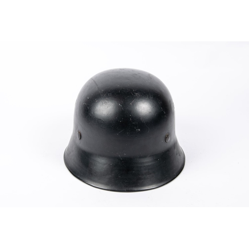 89 - A Third Reich Fire Police double decal steel helmet, with smooth black finish, pale brown lining, to... 