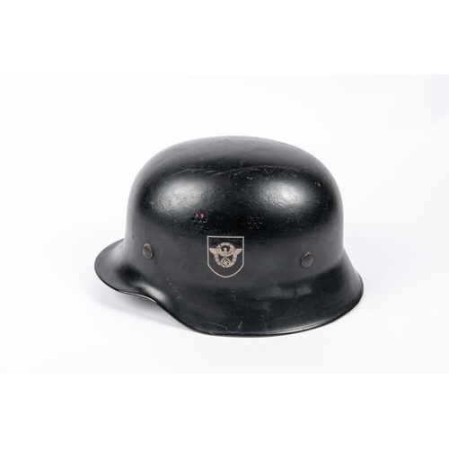 89 - A Third Reich Fire Police double decal steel helmet, with smooth black finish, pale brown lining, to... 