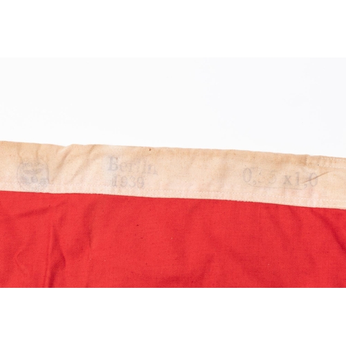 95 - A Third Reich party flag, 100cm x 55cm, central motif of swastika panel, GC  £50-60