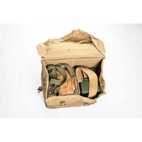 132 - A WWII Field telephone in its case, 