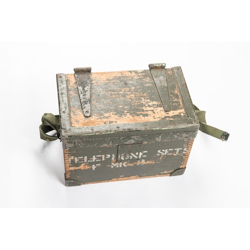 132 - A WWII Field telephone in its case, 