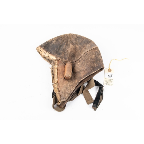 173 - A WWI type leather flying helmet, badly eaten by moth; also a pair of RFC wings, QGC £150-180