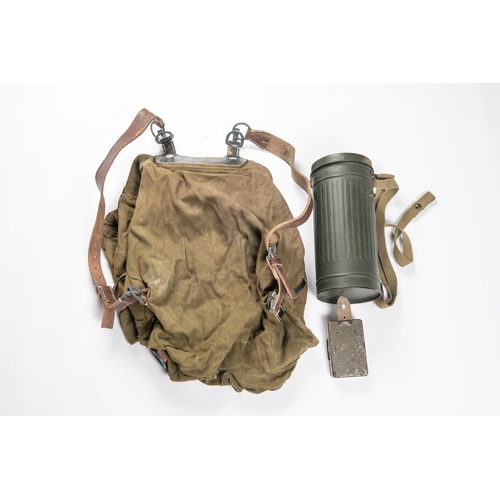 52 - A Third Reich Alpine type rucksack; a gas mask canister marked 