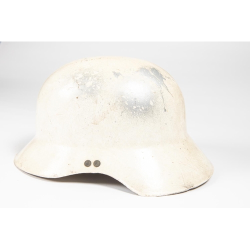 87 - A Third Reich WWII period white fibreglass Luftschutz helmet, with foam top pad, webbing chinstrap, ... 