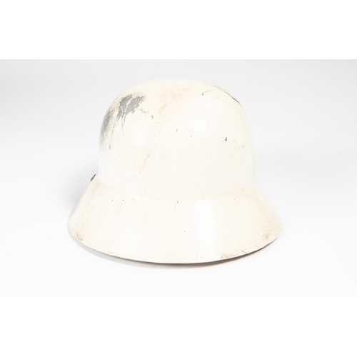 87 - A Third Reich WWII period white fibreglass Luftschutz helmet, with foam top pad, webbing chinstrap, ... 