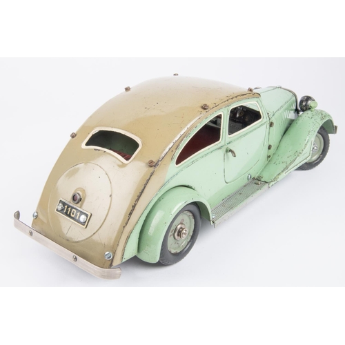 270 - A Marklin clockwork Constructor Car. Bolt together panels in mint green with beige roof and red seat... 