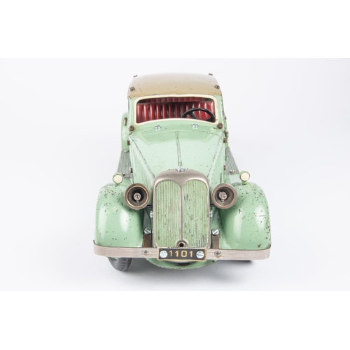 270 - A Marklin clockwork Constructor Car. Bolt together panels in mint green with beige roof and red seat... 