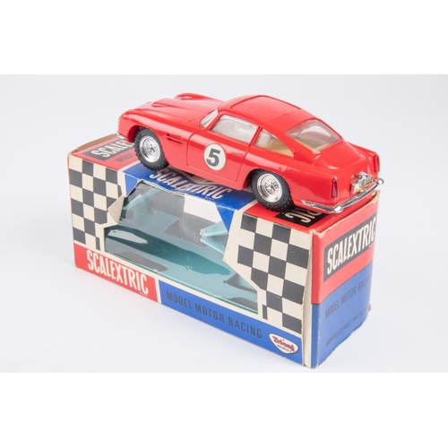 326 - Tri-ang Scalextric (C68) Aston Martin GT (without lights), racing number 5, with red body. Boxed, in... 