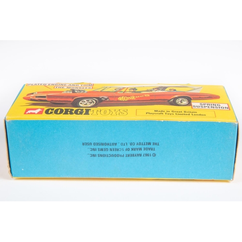 375 - Corgi Toys Monkeemobile (277). The Monkees car in red and white with 4-figures. Boxed with inner tra... 