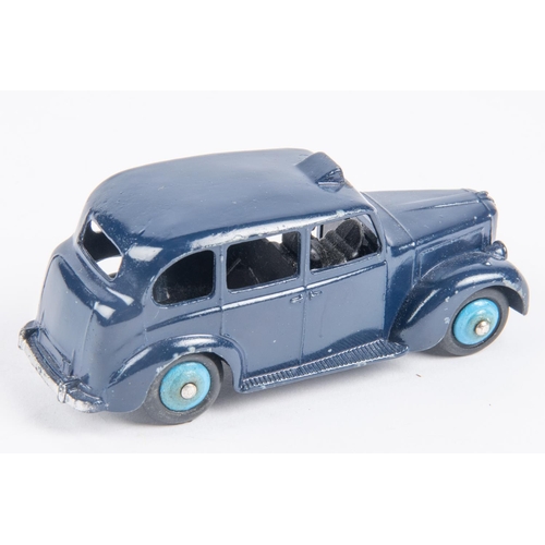 431 - Dinky Toys Taxi (40h). In dark blue with light blue wheels and black chassis. VGC, a few minor chips... 