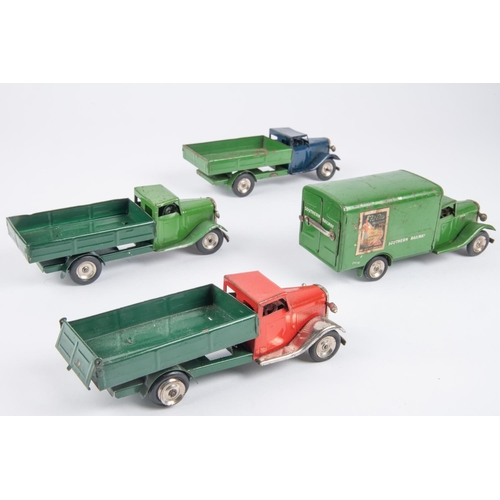 475 - 4 Tri-ang Minic clockwork Lorries. 3x post-war Lorries (25M). One with dark blue cab, one with green... 