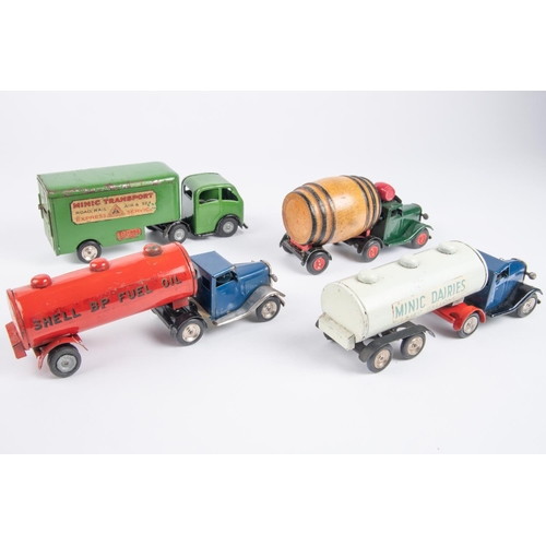 476 - 4 Tri-ang Minic clockwork vehicles. A post war articulated milk Tanker (71M), with a blue standard t... 