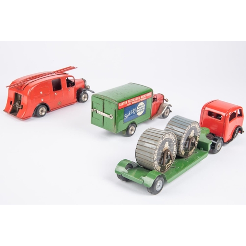 481 - 3 Tri-ang Minic clockwork vehicles. A post war Carter Paterson & Pickfords van (22M). Red cab, green... 