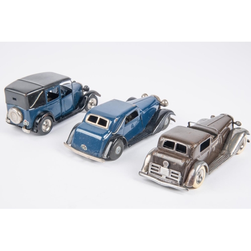 485 - 3 Tri-ang Minic clockwork cars. A pre-war Town Coupe (7M). An example in dark brown with a standard ... 