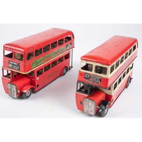 486 - 2 Tri-ang Minic clockwork double decker buses. Two versions, one in red and cream, route 177 and one... 