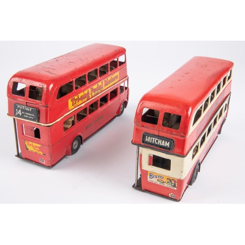 486 - 2 Tri-ang Minic clockwork double decker buses. Two versions, one in red and cream, route 177 and one... 