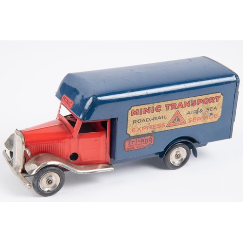 499 - Tri-ang Minic clockwork Luton Transport Van (24M). Red cab with plated mudguards, dark blue van body... 