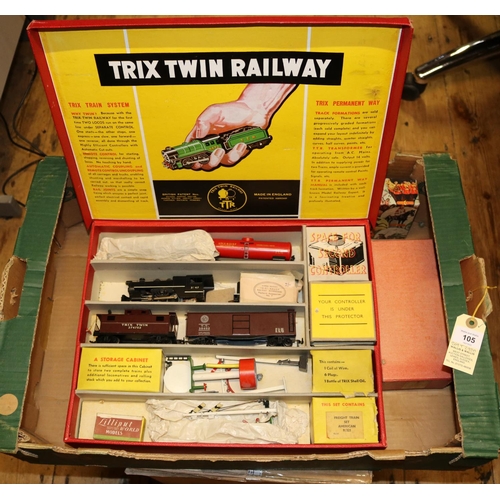 105 - A Trix Twin Railway OO gauge train set. Comprising; US outline 0-4-0 tender locomotive, 3747, in unl... 