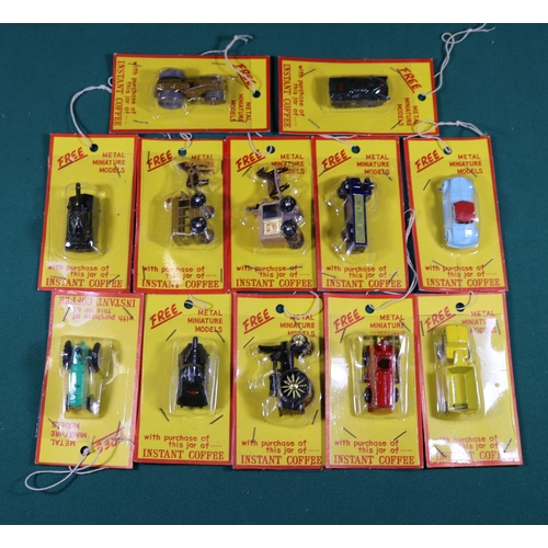 219 - Quantity of small scale die cast minature models comprising of boxed and carded issues. metal minatu... 