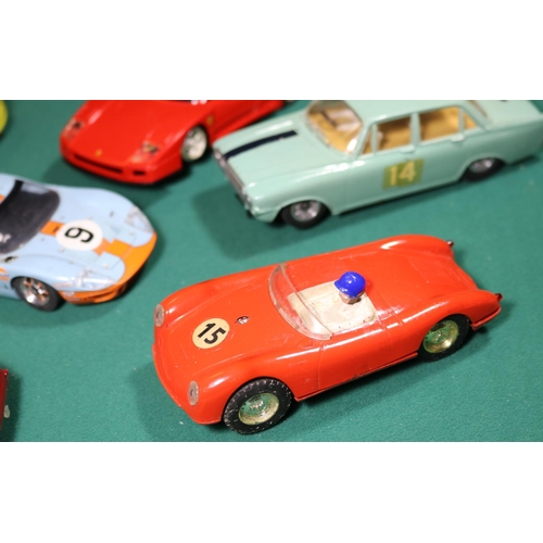 317 - 13x Scalextric racing cars. Including 3x kit-built examples. Most other examples by Hornby Hobbies. ... 