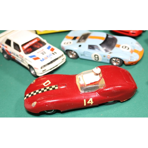 317 - 13x Scalextric racing cars. Including 3x kit-built examples. Most other examples by Hornby Hobbies. ... 