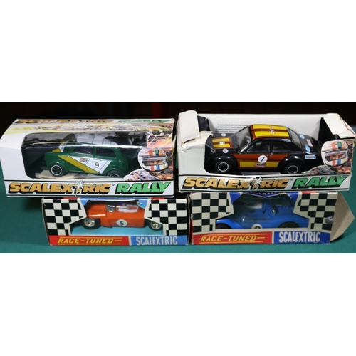 321 - 4x Tri-ang Scalextric cars. 2x Raced Tuned series; (C4) Electra in orange with instructions and inne... 