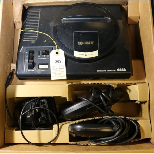 262 - A Sega Mega Drive games console. 16-bit console with 2x controllers. Boxed with inner packing pieces... 