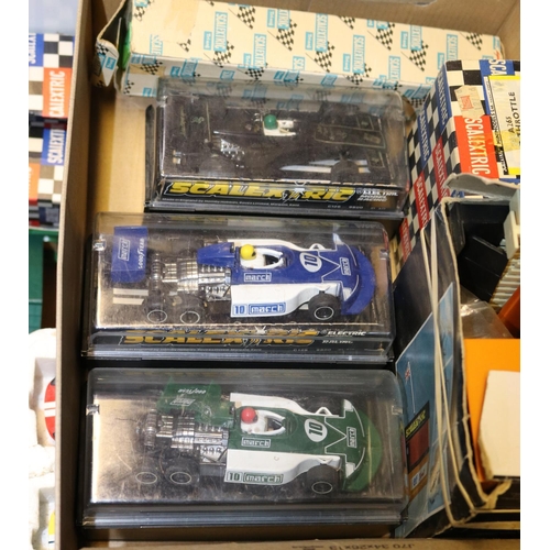 316 - A quantity of Scalextric. Including 5x racing cars including; 2x Ford GT40, 2x March Ford 240 and a ... 