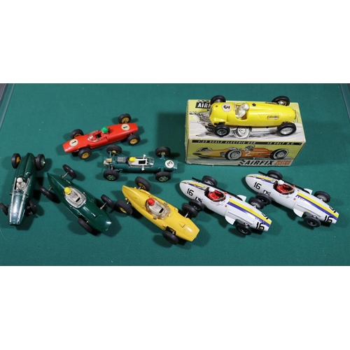 318 - 9x Tri-ang Scalextric, Hornby Scalextric and Airfix slot cars. 2x Airfix; a boxed Auto Union in yell... 