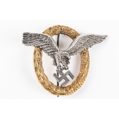 100 - A Third Reich Luftwaffe observers breast badge, in silvered and gilt finish, marked on back 