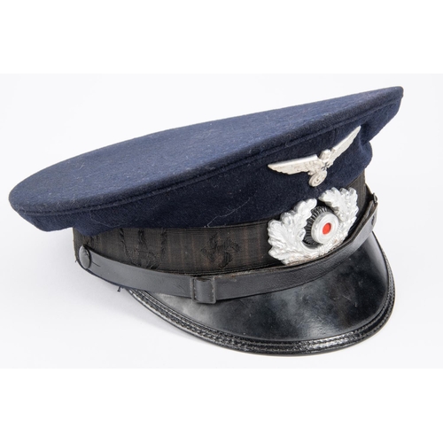 103 - A Third Reich Veterans Association peaked cap, alloy insignia, trade label in lining marked 