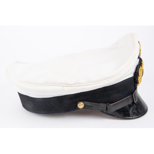 106 - A good copy of a Third Reich Naval officers peaked cap. GC £100-120