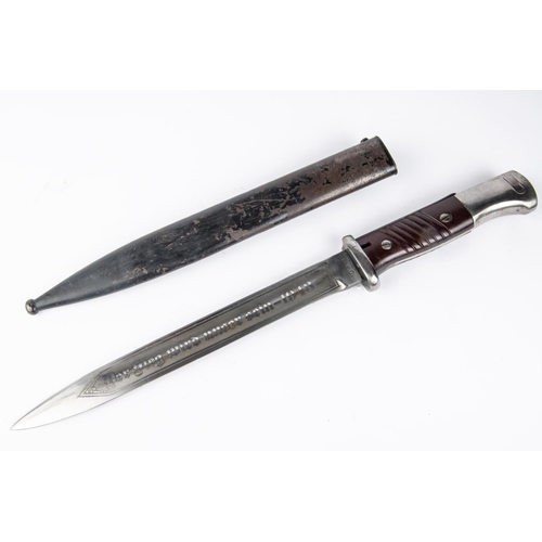 120 - A Third Reich K98 bayonet, by W K C, the blade with later etched panels inscribed 