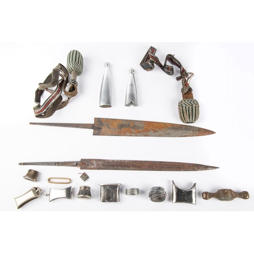 122 - A useful lot of WWII Third Reich dagger parts, including blades, scabbard mounts, dress knots, pomme... 