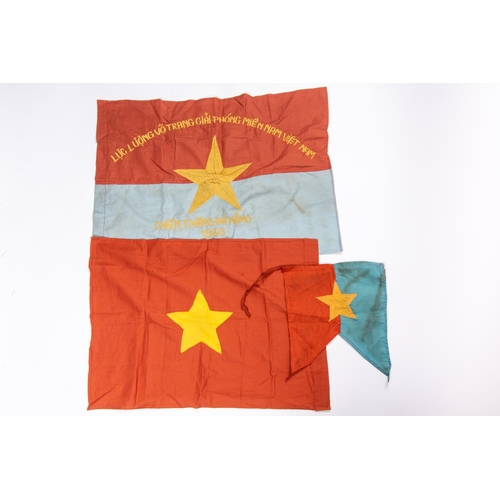 149 - An embroidered blue and red Vietcong flag, 26