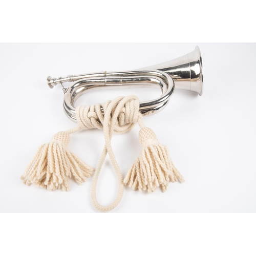 156 - A good silver plated Infantry bugle, with white worsted cords. VGC £50-75