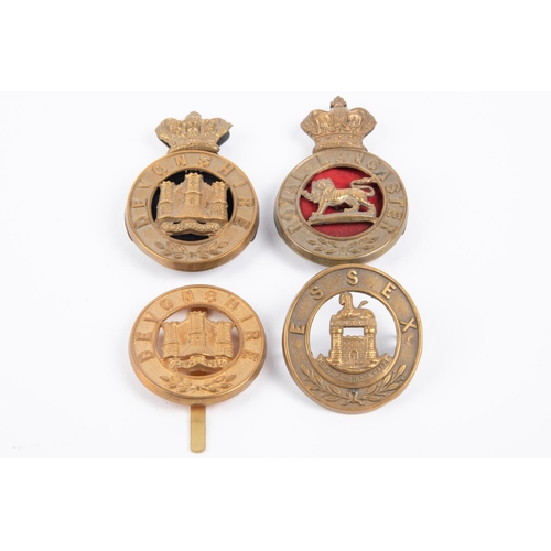 166 - A Victorian two piece glengarry badge on brass backplate of the Royal Lancaster Regt; another of the... 