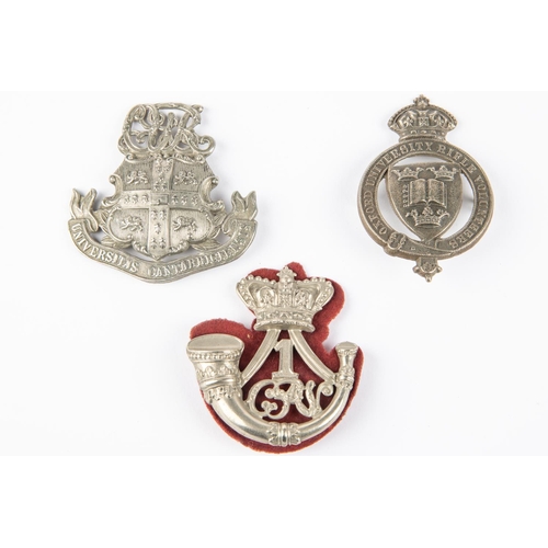 170 - A WM glengarry badge of Oxford University Rifle Volunteers; another, with 